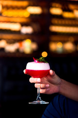 man holding a glass of wine