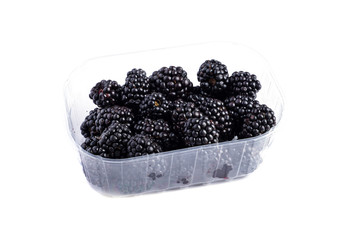 BlackBerry isolated on white in a plastic plate