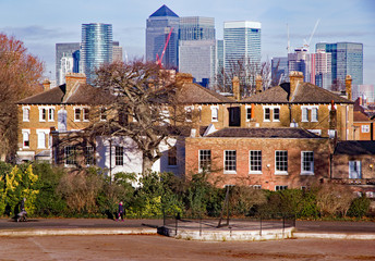 Contrast between Victorian and Edwardian houses in Greenwich, London, England, and the skyscrapers...