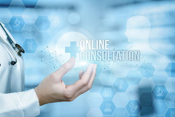 A doctor is holding the online consultation banner in her hand at the background of slight human figure .