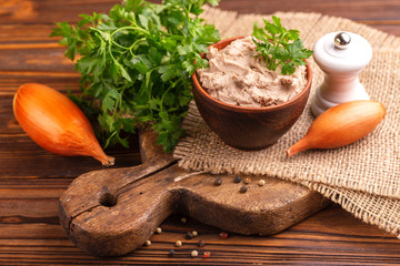 Homemade chicken liver pate with onion and parsley