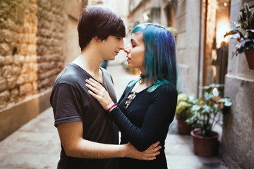 Young couple in love, hugging on the street