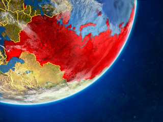 Russia on model of planet Earth with country borders and very detailed planet surface and clouds.