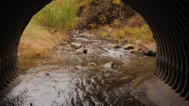 Inside a culvert looking up stream 