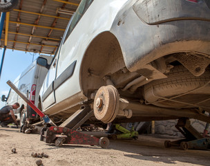 Repair and check disc brake pad before preparing for tire change