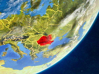 Romania on model of planet Earth with country borders and very detailed planet surface and clouds.