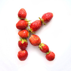 Letter K of the English alphabet from strawberry