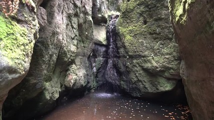 Waterfall at Adrspach Rocks on autumn day, Czech Republic