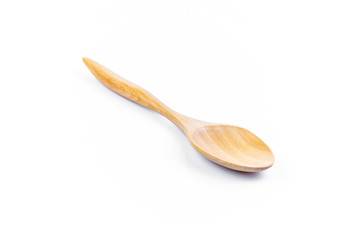 Empty spoon made of wood on white background. Top view. Isolated. Wooden.