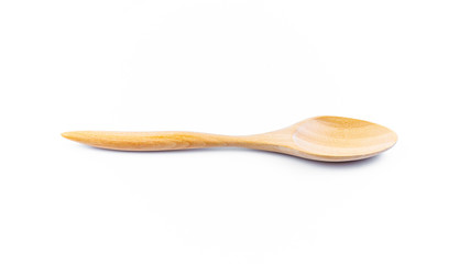 Empty spoon made of wood on white background. Top view. Isolated. Wooden.