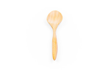 Empty spoon made of wood on white background. Top view. Isolated. Wooden.