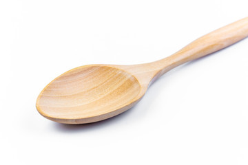 Empty spoon made of wood on white background. Top view. Isolated. Wooden.