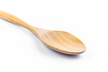 Empty spoon made of wood on white background. Top view. Isolated. Wooden.