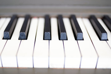 Old piano keys up close