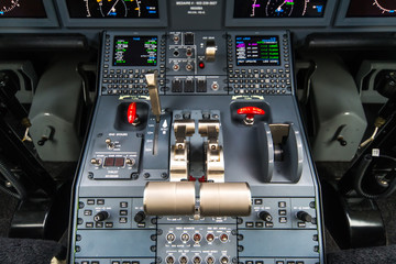 Closeup high detailed view on engine power control and other aircraft control unit in the cockpit...