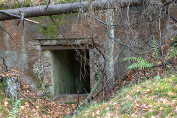 Demolished bunker in Central Europe. Old reinforced concrete fortifications of the Pomeranian...