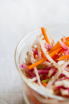 Jicama, Daikon and Carrot Salad with Lemon Sesame Dressing.