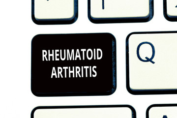Conceptual hand writing showing Rheumatoid Arthritis. Business photo text autoimmune disease that...