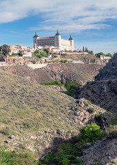 View of the Spanish city of Toledo, seen from the Gothic cathedral of Santa Maria and the Tagus river, in a structure of medieval city