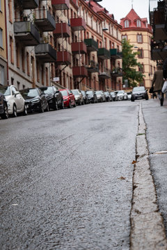 parallel parking cars on the street in the old town