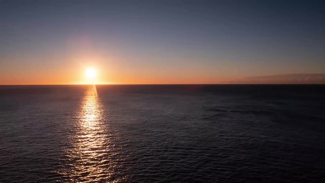 Sunrise time lapse over the Pacific Ocean on a clear day
