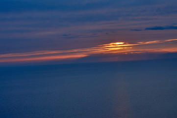 Evening strolls on the hill sun orange and sea view