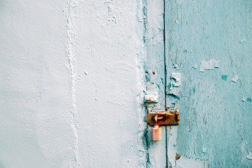 Mint color old wall and door texture background
