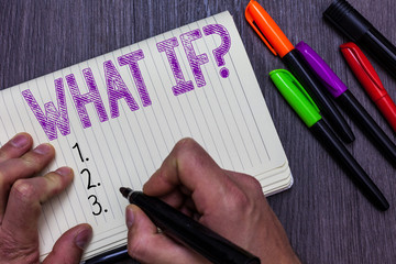 Text sign showing What If question. Conceptual photo Study all possibilities Imagine something happened Man holding marker notebook paper communicating ideas Wooden background