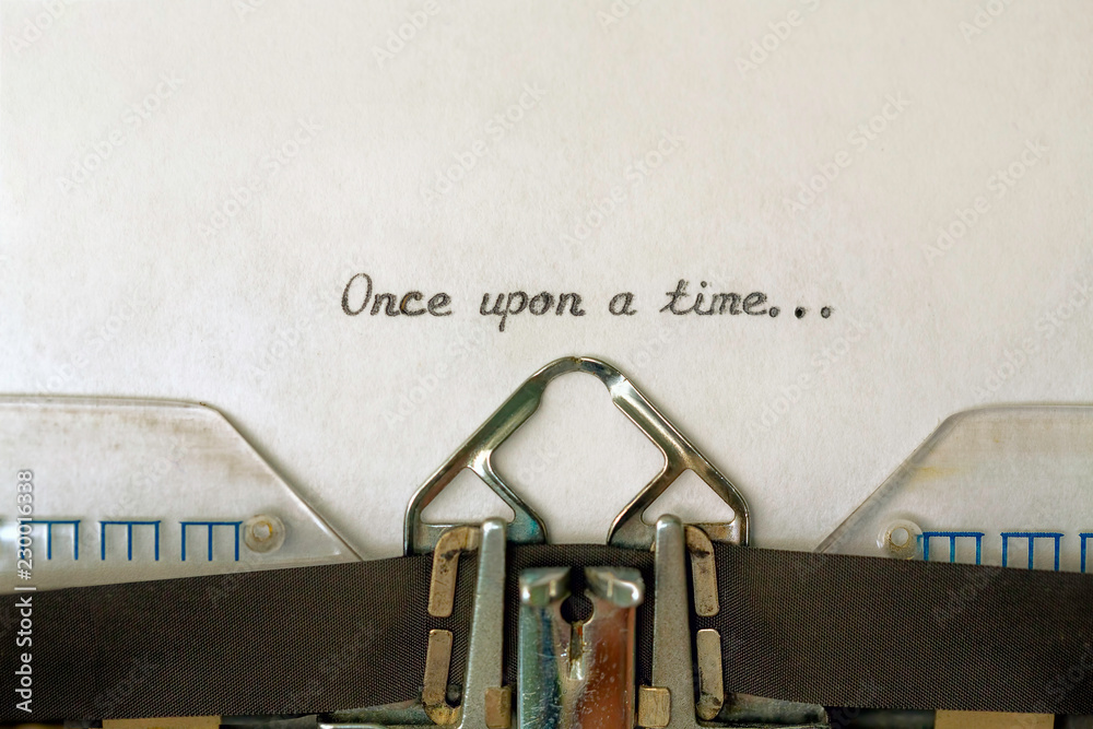 Fototapete once upon a time...typed on a vintage typewriter.