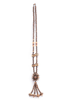 A handmade coconut shell necklace on a white background.