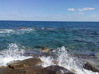 waves crashing on rocks