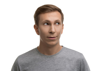 young male in simple gray t-shirt isolated portrait