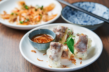 Vietnamese Spring Roll cut in half with sauce