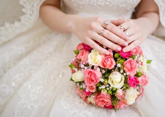 bride holding a wedding bouquet