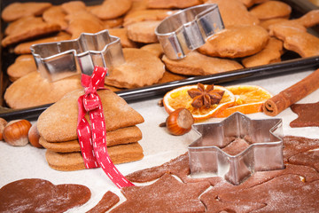 Dough, ingredients for baking gingerbread and fresh baked cookies for Christmas time