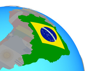 Brazil with national flag on simple blue political globe.