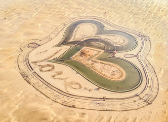 aerial view of al qudra lakes in a desert near Dubai