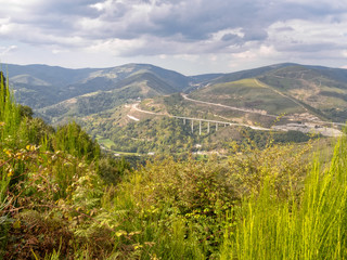 Fototapeta na wymiar View of a viaduct on the A-6 Northwest Highway from Camino Dragonte - Las Herrerias, Castile and Leon, Spain