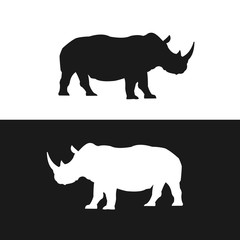 Rhino black and white silhouettes vector © KHAz