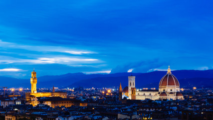 Fototapeta na wymiar Florence Cathedral, Palazzo Vecchio, and the city of Florence, Italy at night