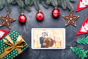 Beautiful celebratory Christmas background. New Year's holidays. Christmas holidays. Beautiful Christmas decorations on the wooden background. Loft style. Mockup