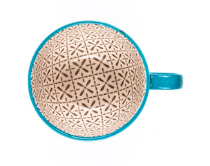 color coffee mug on white isolated background, top view