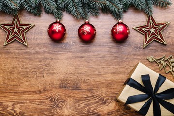 Beautiful celebratory Christmas background. New Year's holidays. Christmas holidays. Beautiful Christmas decorations on the wooden background. Loft style. Mockup