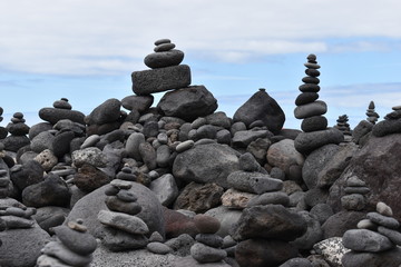 Stacked stone figures on the beach playa jardin in Tenerife in Puerto de la Cruz in Europe