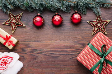 Beautiful celebratory Christmas background. New Year's holidays. Christmas holidays. Beautiful Christmas decorations on the wooden background. Loft style. Mockup