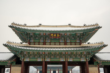 Fototapeta premium The white snow fell geunjeongmun gate in Gyeongbok Palace, Seoul, South Korea