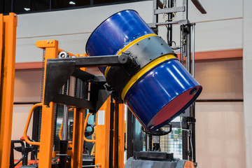 Drum lifted by drum stacker