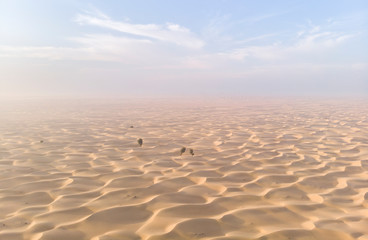 view from above, overlooking sunrise in a desert