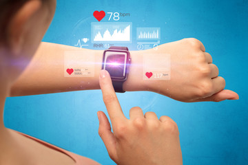Female hand with smartwatch and health application icons nearby. 