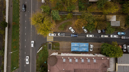 Aerial Drone Flight top down view of freeway busy city rush hour heavy traffic jam highway.  Aerial...